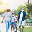 children, adolescents, and parents in masks