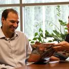 woman working with autistic adult student